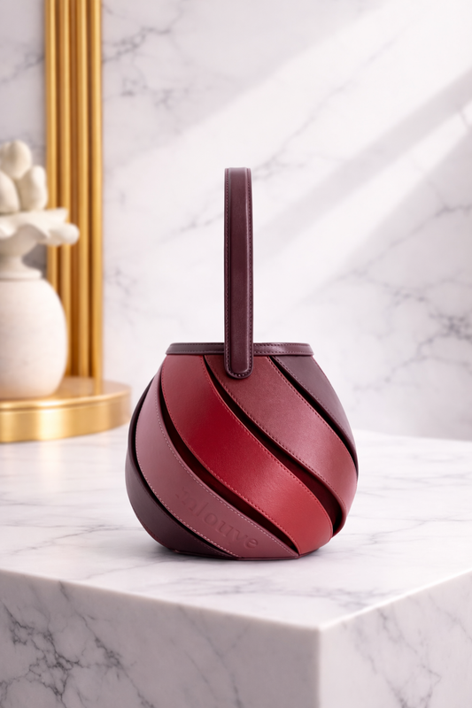 Luxury Sculptural Helix Handbag – Curved Leather Top Handle Statement Bag